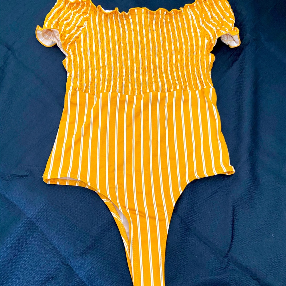 Off the shoulder body suit